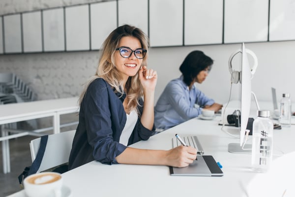 beautiful-female-office-worker-carrying-out-administrative-work-company